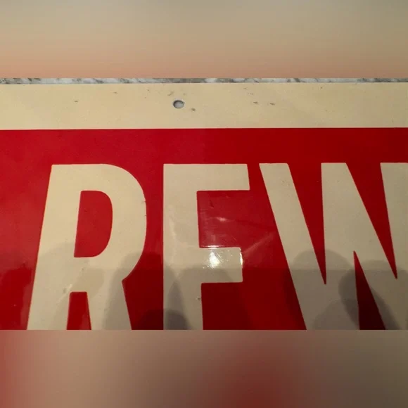 The sign in the image is a Farm Bureau reward sign. Scioto Sign Co. Kenton, Ohio - Picture 5 of 11